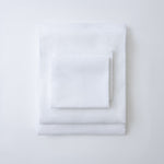 Kite Linens Stay-Tucked Design: Our sheets come in a complete set (fitted sheet, Stay-Tucked top sheet, & two pillow cases.