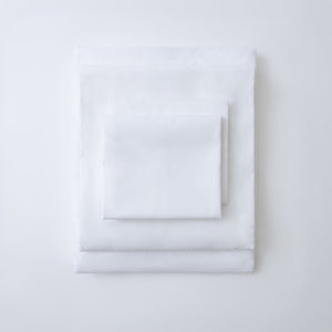 Kite Linens Stay-Tucked Design: Our sheets come in a complete set (fitted sheet, Stay-Tucked top sheet, & two pillow cases.